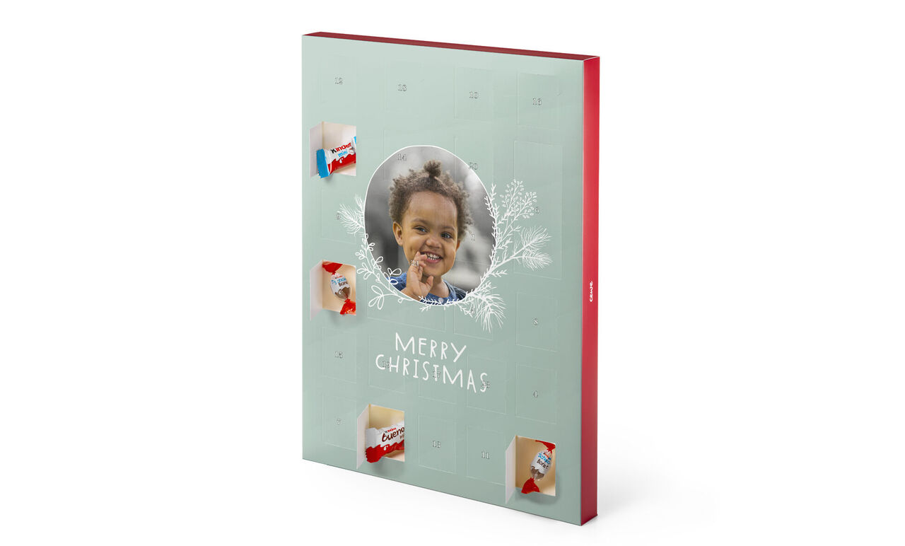 Vårigt fotobok med mönstrat omslag och texten "MERRY CHRISTMAS".