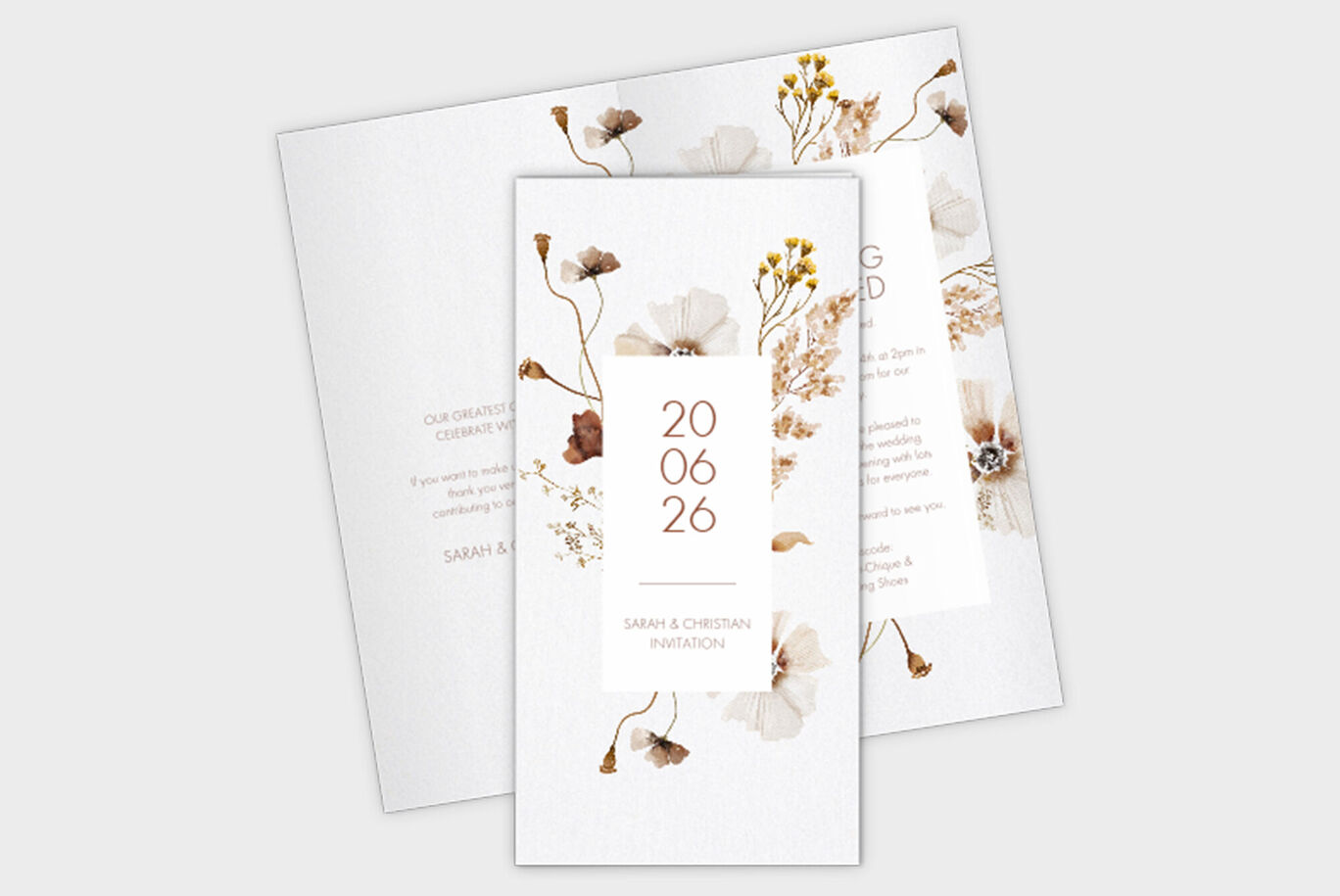 En stilren bröllopskort-design med känsliga blommor och datumet 24.06.23.